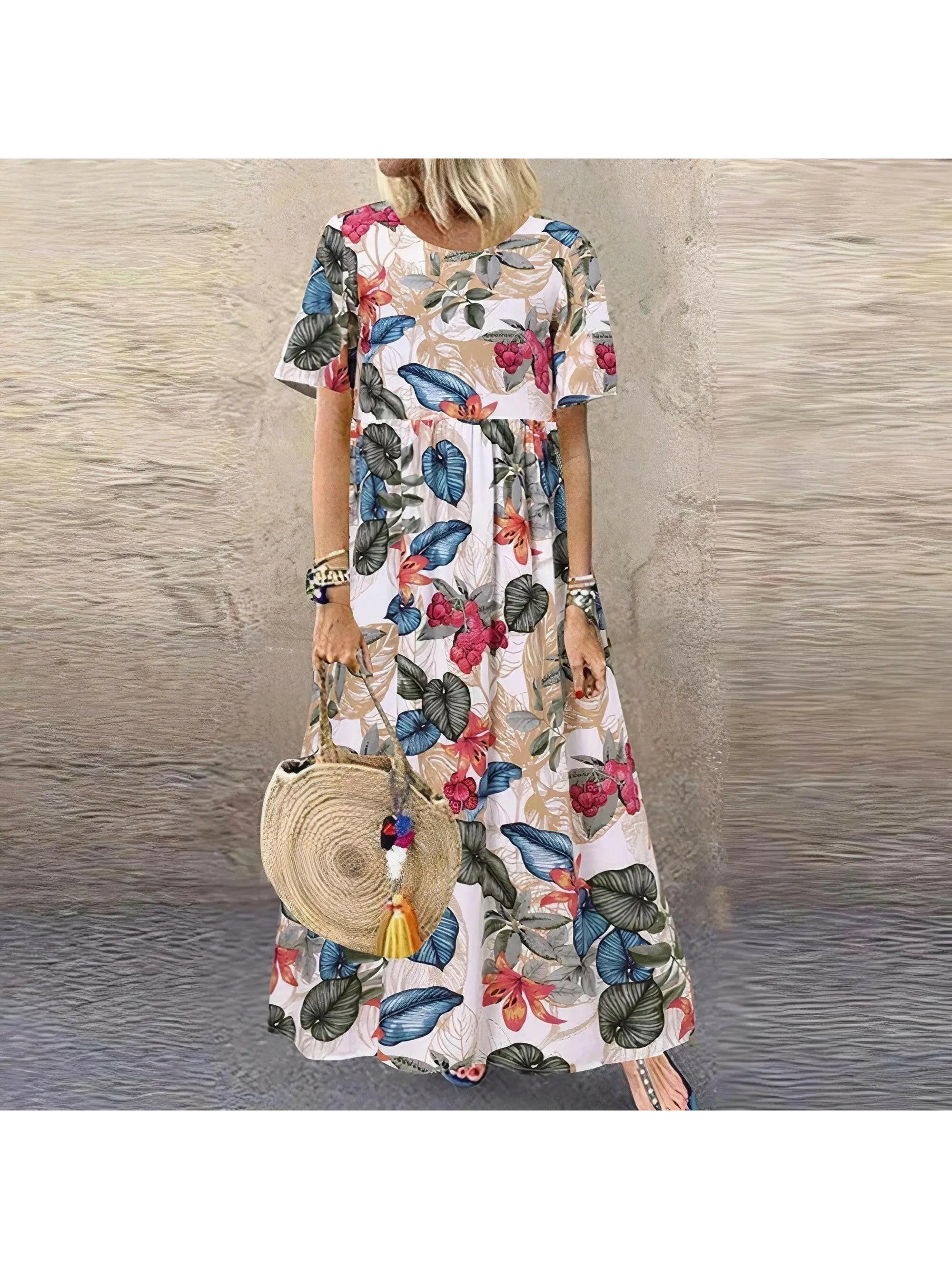 Blue Loewe floral summer dress by Lumina Vancouver, elegant and comfortable with a vibrant floral pattern.