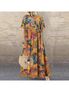 Loewe floral summer dress by Lumina Vancouver, elegant and comfortable with a vibrant blue floral pattern, perfect for warm weather.