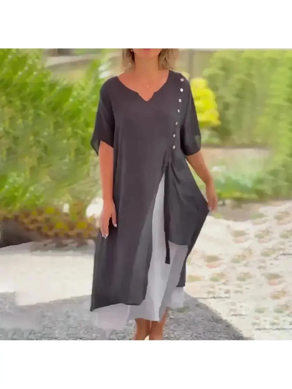 Lumina Vancouver Rosalie solid color maxi dress in blue, featuring a flowing silhouette and elegant design.