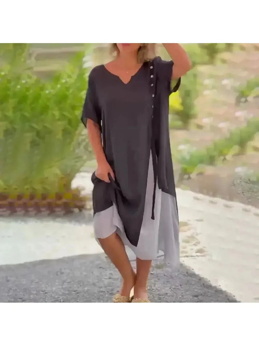 Lumina Vancouver Rosalie blue maxi dress featuring a classic solid color design, flowing fabric, and elegant long silhouette.