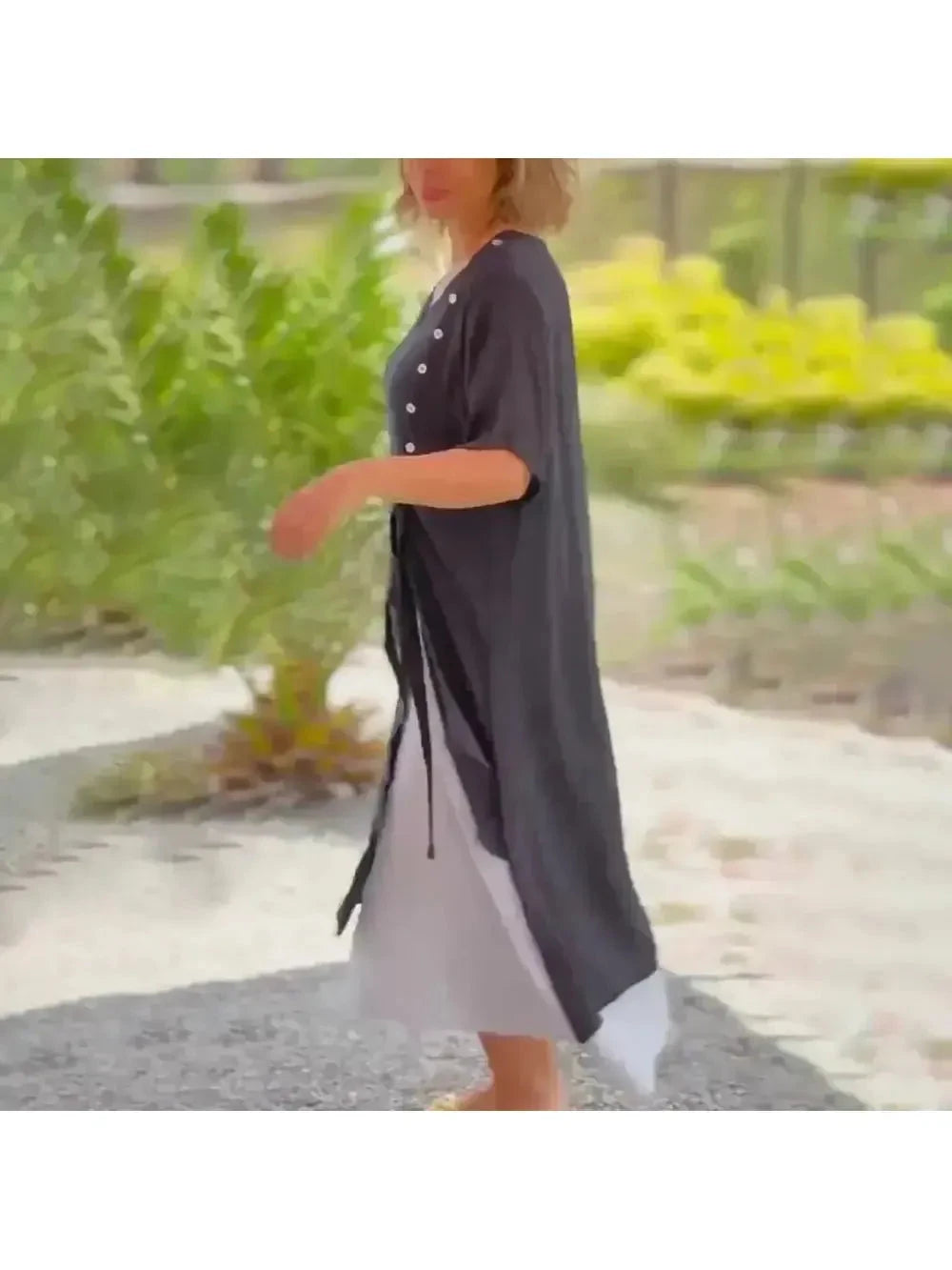 Lumina Wear Rosalie classic solid color maxi dress in Vancouver blue, flowing fabric, sleeveless design, and ankle-length silhouette.