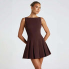 Brown Ranta Nightfall mini dress by Lumina Vancouver, featuring a stylish, fitted design with elegant detailing.