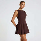 Lumina Vancouver Ranta Nightfall mini dress in brown, showcasing the fitted silhouette and stylish design.