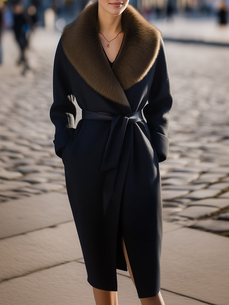 Black Lumina Vancouver wool coat with oversized fur collar, styled on a model, showcasing its elegant and cozy design.
