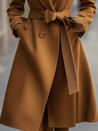 Camel wool trench coat with belt from Lumina Vancouver, featuring a classic silhouette and tailored design.