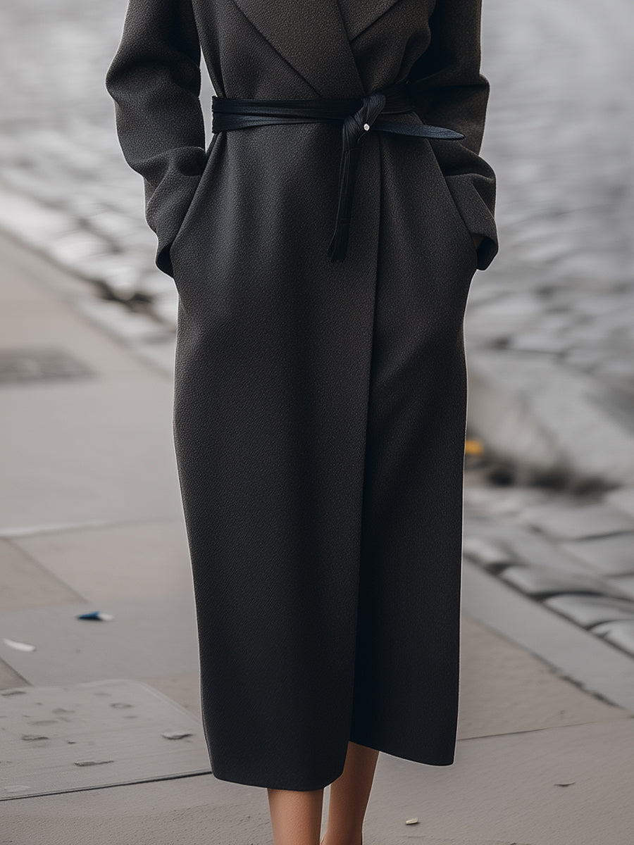 Charcoal Petronella Lumina Vancouver wrap coat with belt, shown on model, highlighting its stylish design and cozy fit.