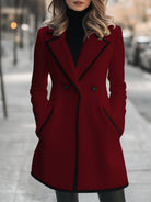 Lumina Vancouver double-breasted white coat with black trim, stylish women's coat featuring classic design and elegant details.