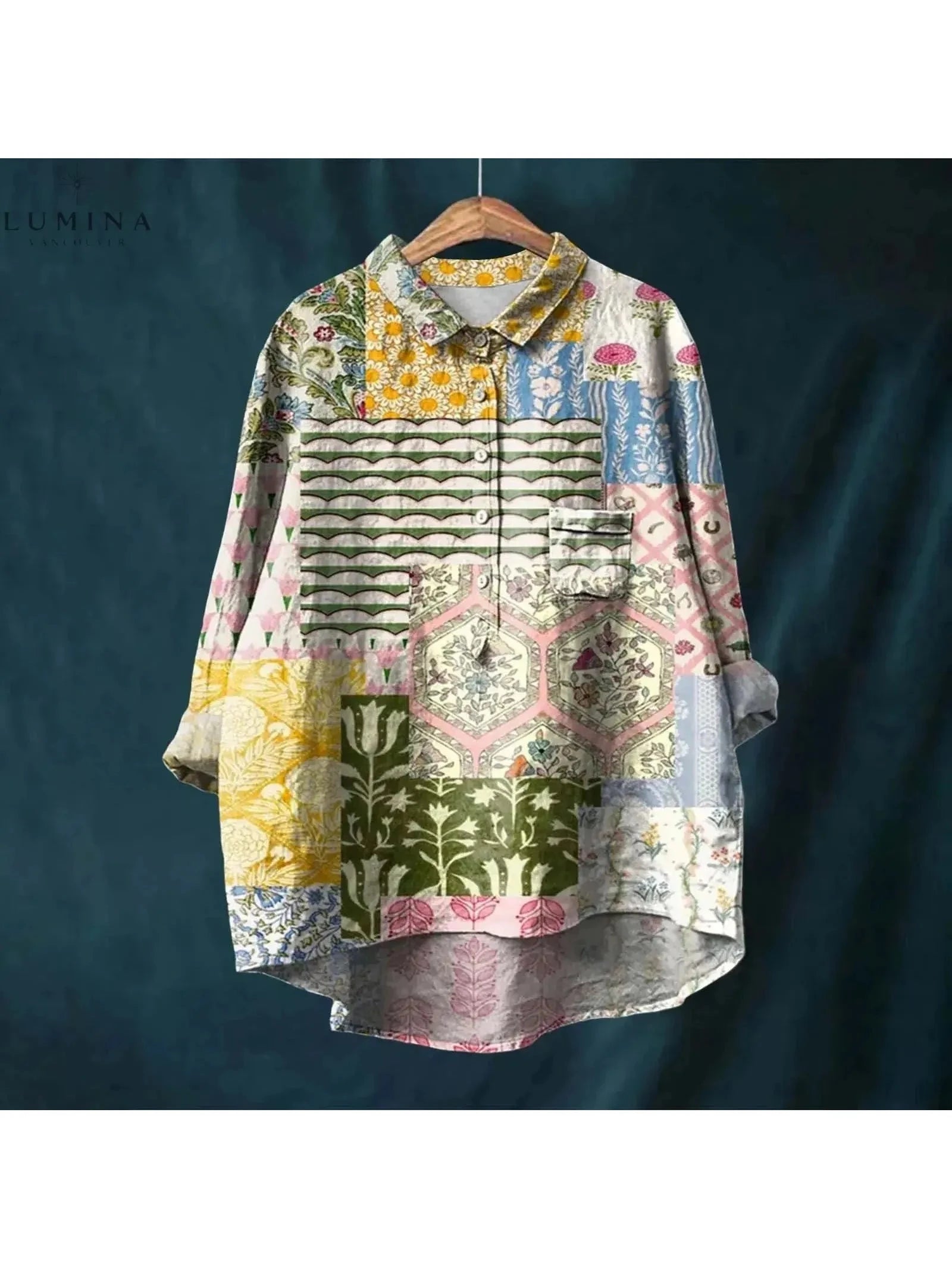 Gray Natasha Art Elegant Floral Blouse from Lumina Vancouver's collection, featuring intricate floral patterns and a stylish blouse design.