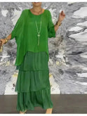 Dark green Caroline loose round neck dress by Lumina Wear, featuring a relaxed fit and simple, elegant design.