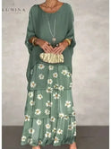 Dark green Caroline loose round neck dress by Lumina Wear, featuring a relaxed fit and casual style, displayed on a hanger.