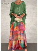 Dark green Caroline loose round neck dress by Lumina Wear, shown on a model with a casual fit and relaxed style.