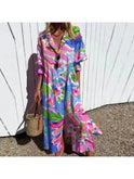 Colorful boho maxi dress by Lumina Wear featuring vibrant patterns and flowing fabric, perfect for casual or beachwear.