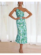 Orange floral-patterned dress by Lumina Vancouver featuring a stylish, feminine design with vibrant flower details.