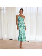 Orange floral patterned dress by Lumina Vancouver, featuring a stylish design with vibrant flower prints.