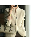 Beige Lumina Wear Nela knitted cardigan with a textured knit pattern, displayed on a neutral background.