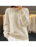 Beige Lumina Wear Camila Elegant Knit Sweater with a cozy, fitted design and ribbed cuffs, displayed on a neutral background.