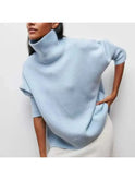 Blue Lumina Wear Mia cozy turtleneck sweater, soft knit with a comfortable fit, shown on a model.