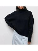 Blue Lumina Wear Mia cozy turtleneck sweater with ribbed cuffs and neckline, styled casually on a mannequin.