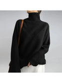Lumina Wear Nora khaki turtleneck sweater, close-up of the cozy knit fabric and high neckline, size small.
