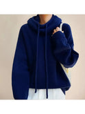 Sage green Zulema Comfort Sweater by Lumina Wear, cozy knit sweater with a relaxed fit and ribbed cuffs.