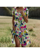 Lumina Vancouver Callie Spring Dress featuring a colorful floral pattern and lightweight fabric, perfect for warm weather.