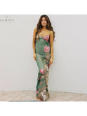 Green Gaia flower dress by Lumina Wear, lightweight floral dress with vibrant pattern, perfect for casual and holiday wear.