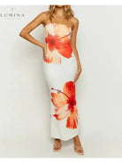 Lumina Vancouver Hawin bandeau summer dress in vibrant orange with holiday vibe, perfect for warm weather and beachwear.