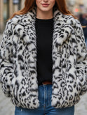White Lumina Wear Doris faux fur jacket on a model, showcasing its plush texture and stylish design.