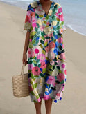 Multi-color flower dress by Lumina Wear featuring a vibrant floral pattern and lightweight fabric, perfect for spring or summer.