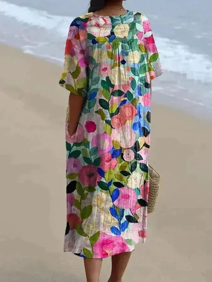 Lumina Wear Jovana multi-color floral dress with vibrant garden-inspired pattern, perfect for casual or special occasions.