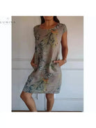 White Lumina Vancouver Pascaline dress with round neck, elegant casual clothing for women, displayed on a dress form.