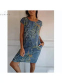 Lumina Wear Pascaline dress with a round neck, white fabric, and elegant fit, perfect for casual or semi-formal occasions.