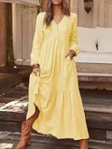 Light yellow Lumina Wear Giulia long sleeve dress displayed on a mannequin, showcasing a stylish, elegant design.