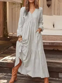 Light yellow Lumina Wear Giulia long sleeve dress with a fitted silhouette and elegant design, shown on a model.