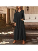 Light yellow Lumina Wear Giulia long sleeve dress displayed on a hanger with a simple background.