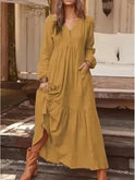 Light yellow Giulia long sleeve dress by Lumina Wear, shown on a model with a fitted silhouette and elegant design.