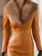 Lumina Wear Mira faux leather maxi dress with fur trim, caramel color, showcasing its stylish midi dress design and texture.