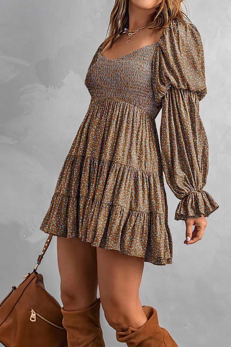 Apricot Avalyn off-shoulder mini dress by Lumina Wear, featuring a stylish fitted silhouette and elegant neckline.