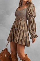 Apricot Avalyn off-shoulder mini dress by Lumina Vancouver, featuring a stylish and feminine design perfect for summer wear.