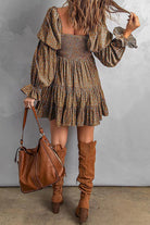 Apricot off-shoulder mini dress by Lumina Vancouver, featuring a stylish and feminine design perfect for casual or semi-formal occasions.