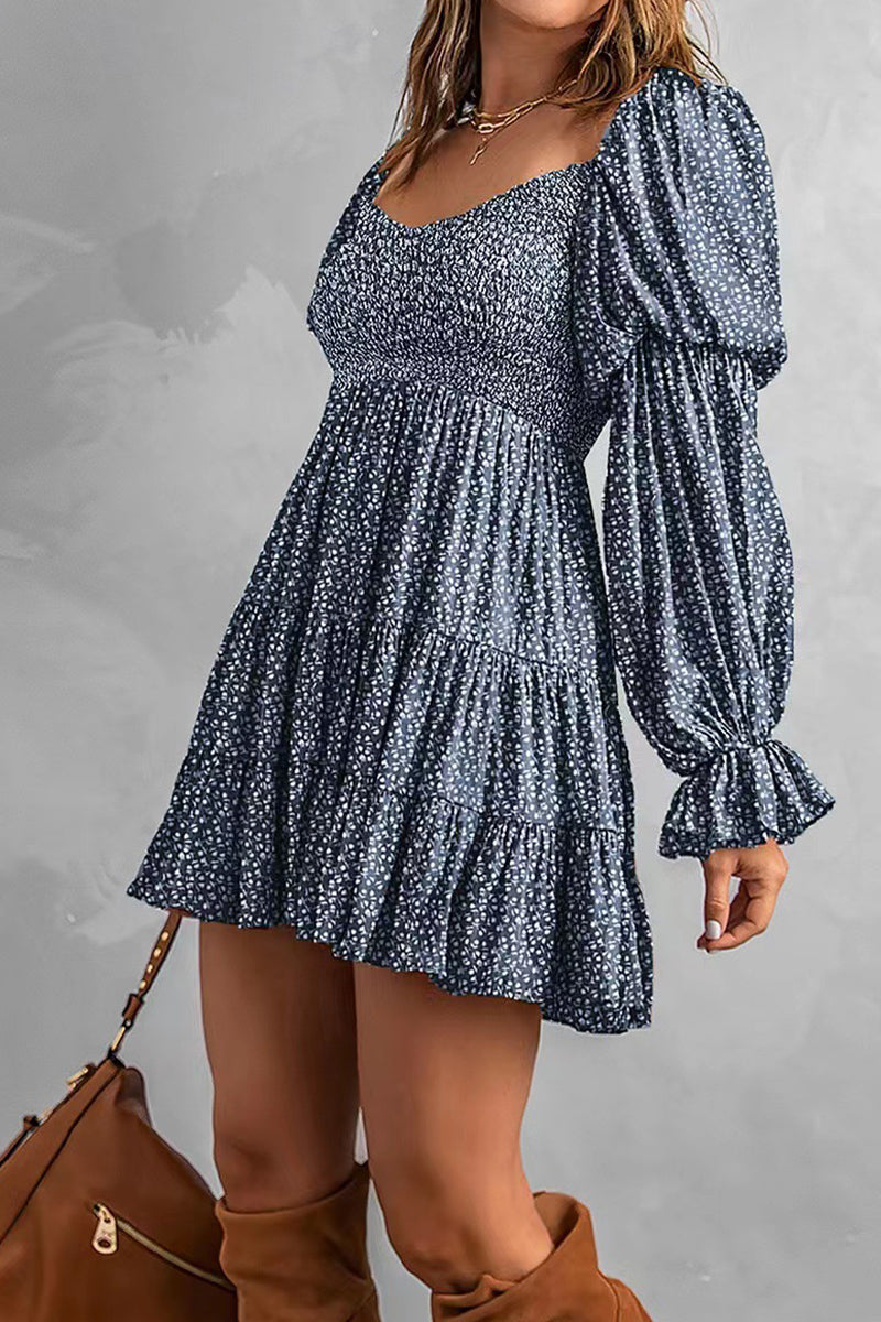 Apricot off-shoulder mini dress by Lumina Vancouver, featuring a stylish and fitted design perfect for summer or casual occasions.