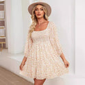 Light apricot Lumina Wear Elara Whisper Breeze A-Line Mini Dress displayed on a hanger with soft fabric details.