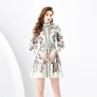 Apricot embroidered mini dress by Lumina Vancouver with short sleeves and intricate floral embroidery.