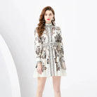 Apricot embroidered mini dress by Lumina Vancouver featuring a stylish short dress design with intricate embroidery.