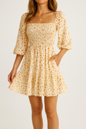 Apricot Valentina Rose Harlow A-Line Mini Dress by Lumina Wear, shown on a model with stylish design details.