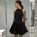 Black Alexandrine Halter Neck Mini Dress by Lumina Wear, stylish sleeveless dress with a halter neckline and fitted silhouette.