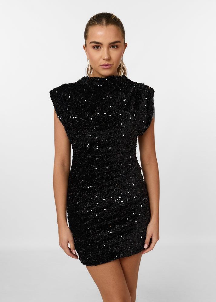 Black sequin embellished mini dress by Lumina Vancouver featuring a fitted silhouette and stylish design.
