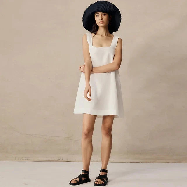 Black Celestina sleeveless mini dress by Lumina Vancouver, featuring a fitted bodice and stylish mini length.