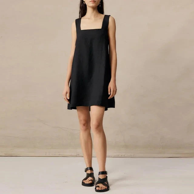 Black Celestina sleeveless mini dress by Lumina Vancouver, fitted style with a sleek, modern silhouette for stylish occasions.