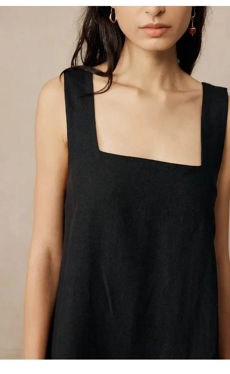 Black Celestina sleeveless mini dress by Lumina Vancouver, showcasing a fitted silhouette and stylish design.